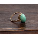 A 9ct gold and amazonite cabochon ring. 2.3g Size L,