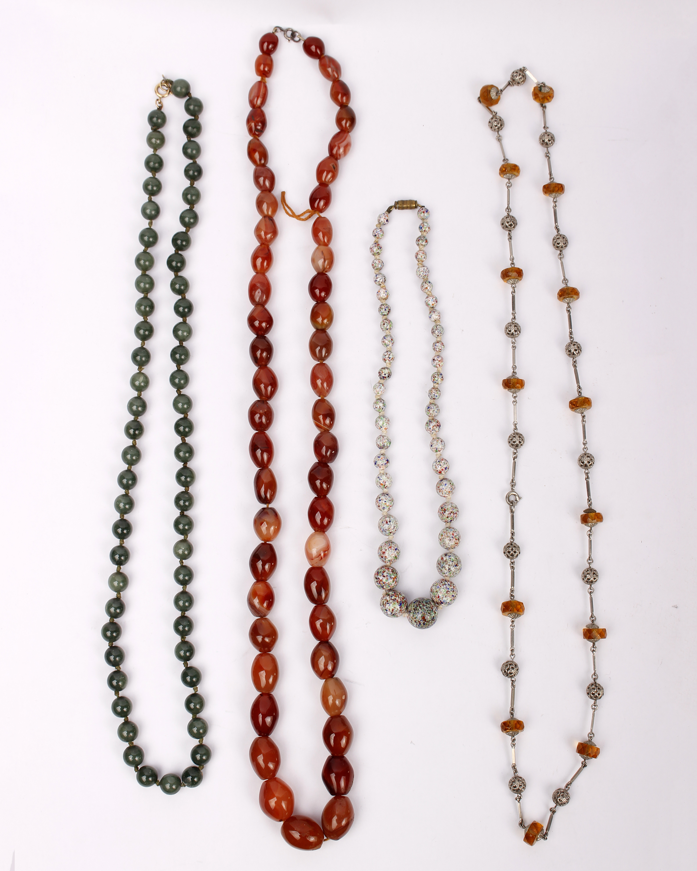 Three hard stone bead necklaces plus another