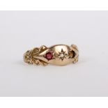 A 9ct gold ring, set with a diamond and a circular cut ruby, stamped 375 with Chester hallmarks,