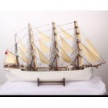 A model of The Queen Margaret four-masted steel barque ship built in 1893 by A. MacMillan & Son