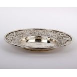 A sterling silver dish with repousse work design by Henry Hobdell London 1865 4ozt 18cm(W)