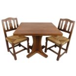 Four 1933 Robert 'Mouseman' Thompson English Oak Dining Chairs and An English Oak Dining Table,