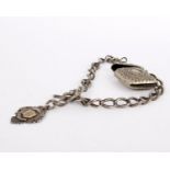 A silver fob and curb link chain, the fob stamped with full Birmingham hallmarks, the chain