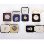 A Collection of Gold and Silver Coins and Medals, Seven Items in TotalA 9ct Gold Gloucestershire