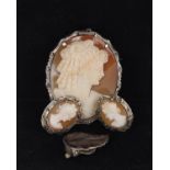 A shell cameo brooch/pendant, the oval shell cameo carved with a lady's profile, 4cm long;