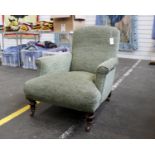 An Antique Armchair On Castors In The Style of Howard & Sons(H)79 x (W)70 x (D)100 cm