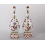 A pair of Gilt Hand Painted Royal Vienna vases on plinths marks to base of plinth - Honeycombe