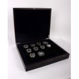 A collection of 23 silver royalty thematic silver coins in a case. Predominantly Commonwealth