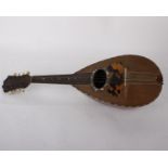 An antique Mandolin label inside to read - Luigi Gorra Dotti Figli - made in Rome with mother of
