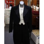 A 1930/40's vintage gents tailcoat suit with piped side seam trousers together with a Radiac and