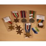 A lot of 8 military medals, to include a WWI Victory, WWII Defence and Victory, WWII Africa /