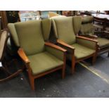 A Pair of Parker Knoll PX 988 Wing Back Armchairs in Green