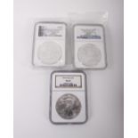 A trio of NGC certified American Silver Eagles, being a 1993 (MS69), a 2014-S (MS69), and a 2014-