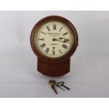 A late Victorian oak wall clock, enamelled dial signed Camerer, Kuss & Co., 56 New Oxford Street,