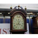 A 19th Century Victorian antique mahogany longcase grandfather clock by Jas. Moore of Warminster.