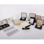 An assortment of boxed world proof mostly Crown-size coins & sets (13 items), issued between 1964-