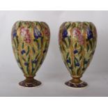 A Pair of Fischer Budapest VasesWith gilt floral decorationStamped 'Budapest' underneath(H)30 x (W)