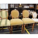 A Harlequin Set of Four Louis XVI Style Chairs Three chairs have matching frames and one has a