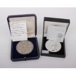 A pair of substantial cased sterling silver medals, to include 3oz Machin Head commemorative