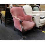 A Victorian Rosewood Smokers' ArmchairIn blushed pink velour upholstery with carved knuckles and