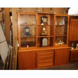 A Mid Century Style Wall Unit In TeakThe top half is detachable(H)171 x (W)168 x (D)45 cm