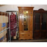 An Edwardian Oak WardrobeWith a mirror door and one drawer(H)203 x (W)87 x (D)41 cm