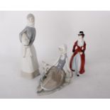 Two Lladro figures - Girl with a lamb 1969-93 and a Lladro girl figurine Shepherdess with doves