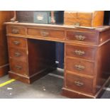 An Edwardian Leather Inset Cedar Pedestal DeskConsisting of nine drawers(H)74 x (W)123 x (D)65 cm