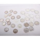 An assortment of 31 pure silver 1oz Britannia coins, to include special issues.