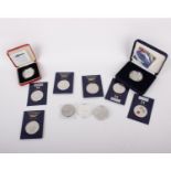 An assortment of 11 different commemorative UK £5 coins, dating from 2000-2020, to include silver