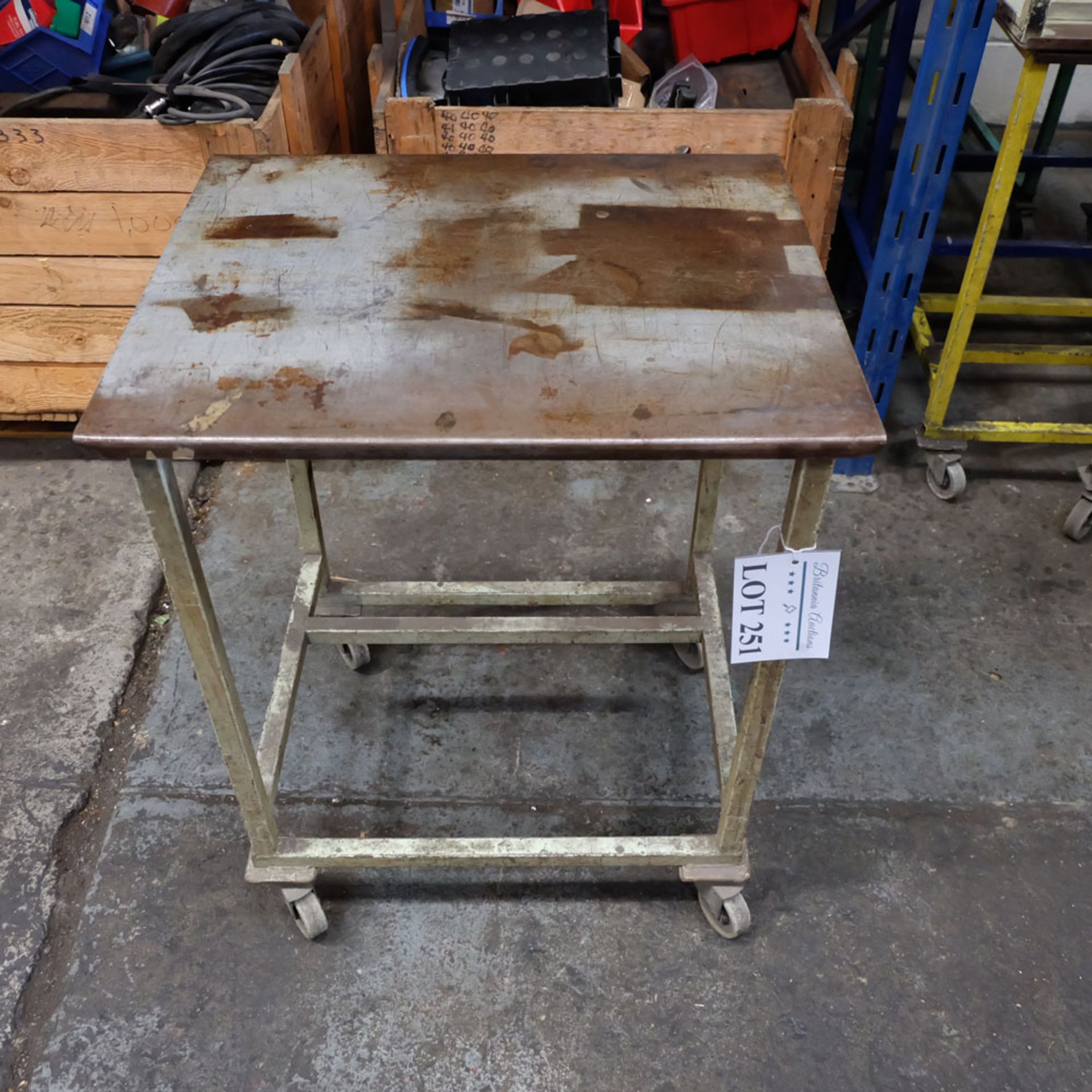 Mobile Steel Table on Castors. Approx Working Height 750mm. Approx Surface Size 610mm x 500mm.