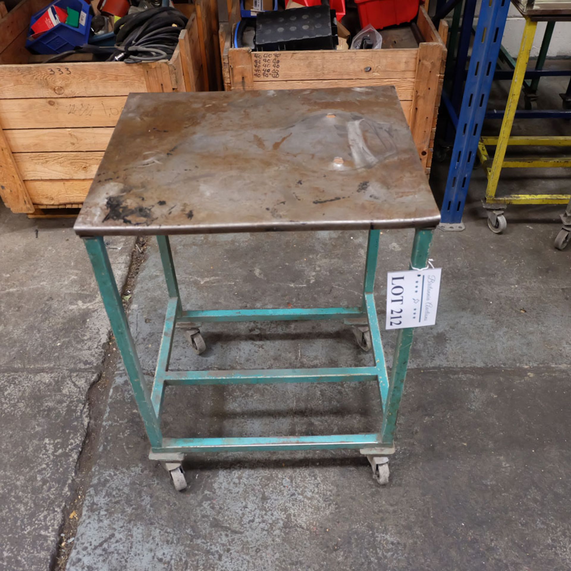Mobile Steel Table on Castors. Approx Working Height 770mm. Approx Surface Size 560mm x 480mm.