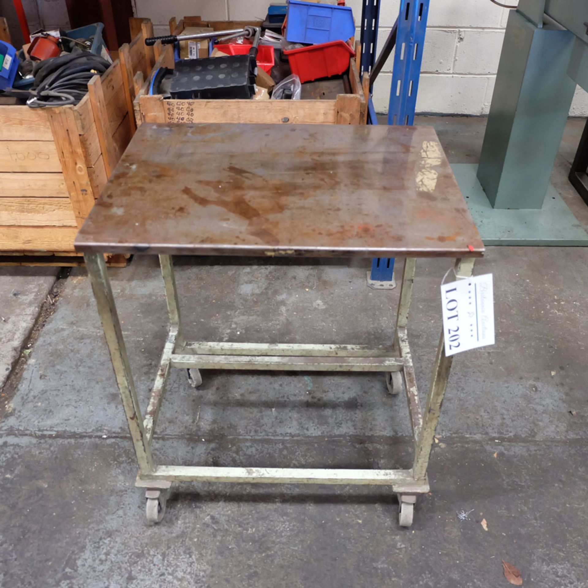 Mobile Steel Table on Castors. Approx Working Height 750mm. Approx Surface Size 640mm x 500mm.