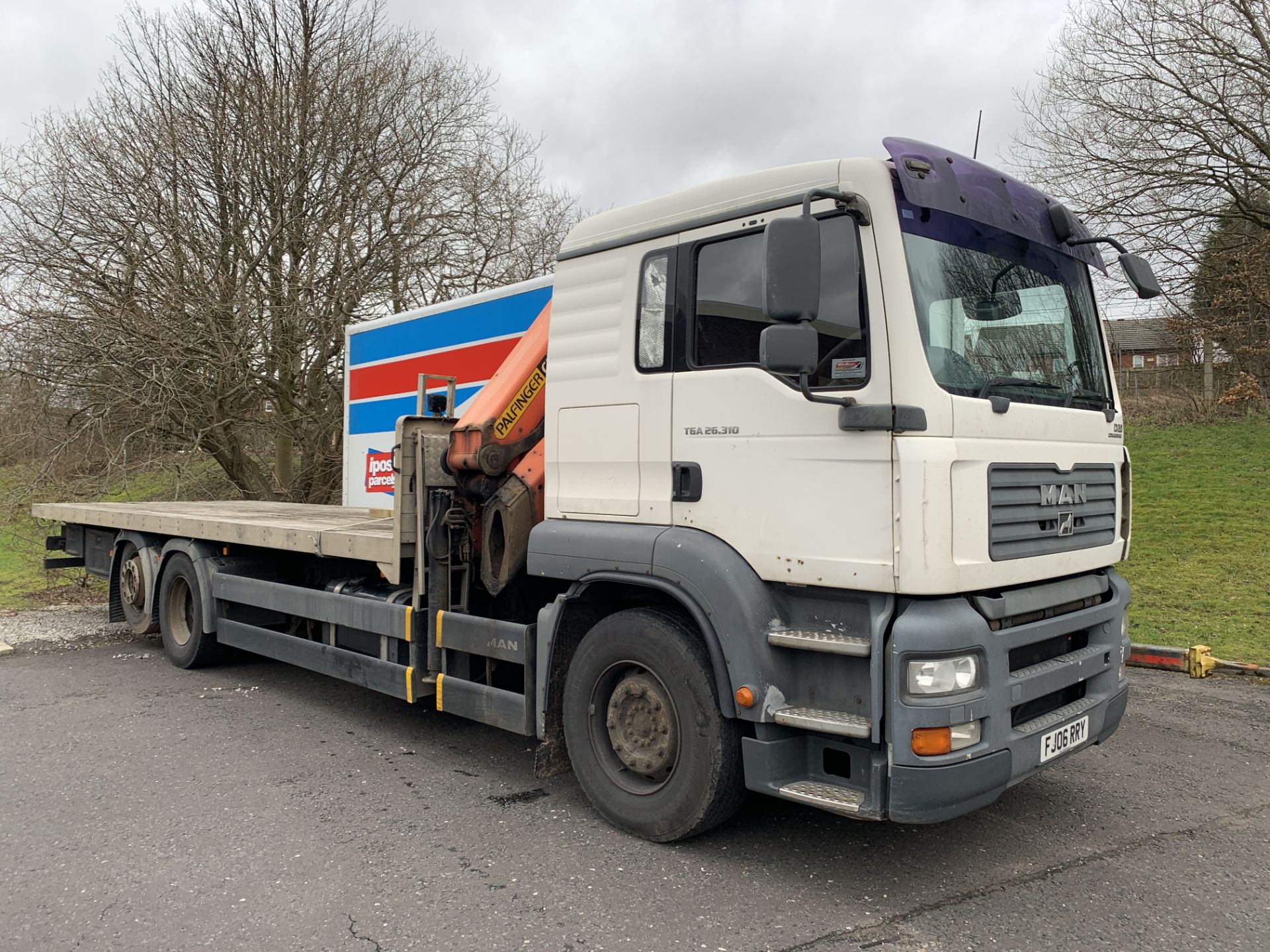 MAN TGA 26.310 Flatbed Lorry with Palfinger PK23002 Crane. 26,000KG Gross Weight. Year 2006.