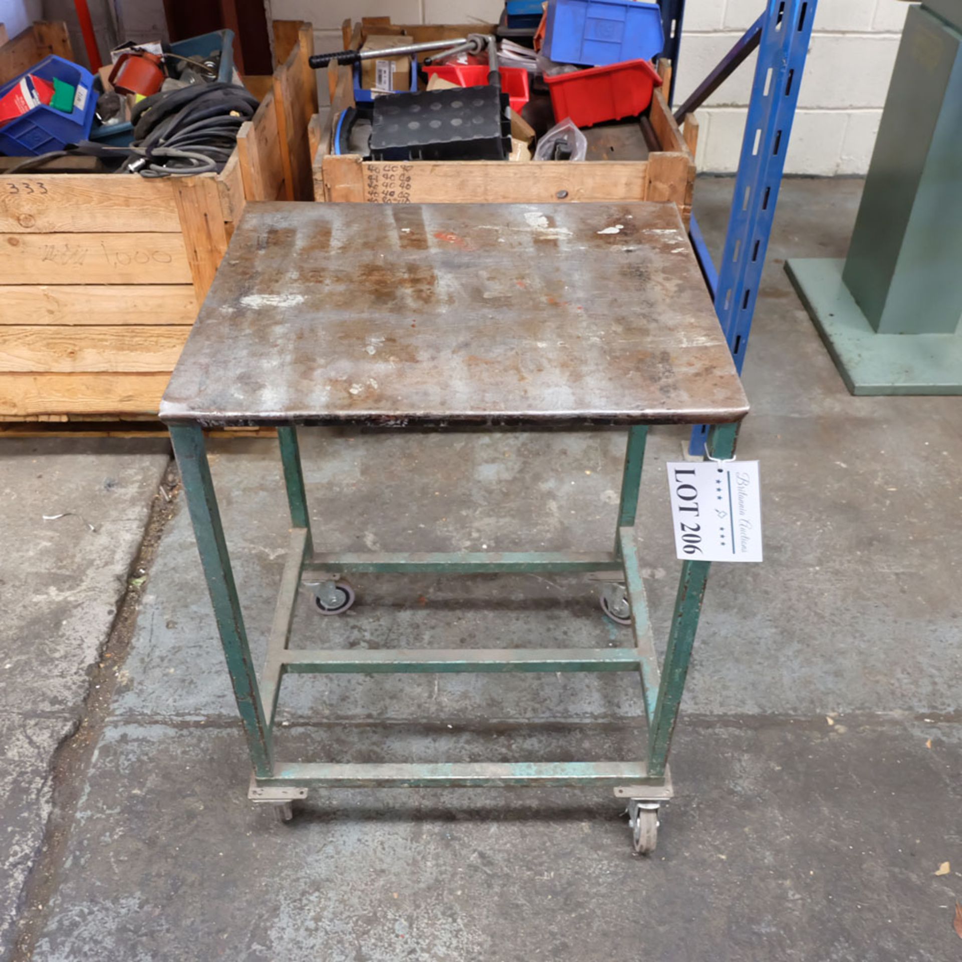 Mobile Steel Table on Castors. Approx Working Height 760mm. Approx Surface Size 560mm x 470mm.