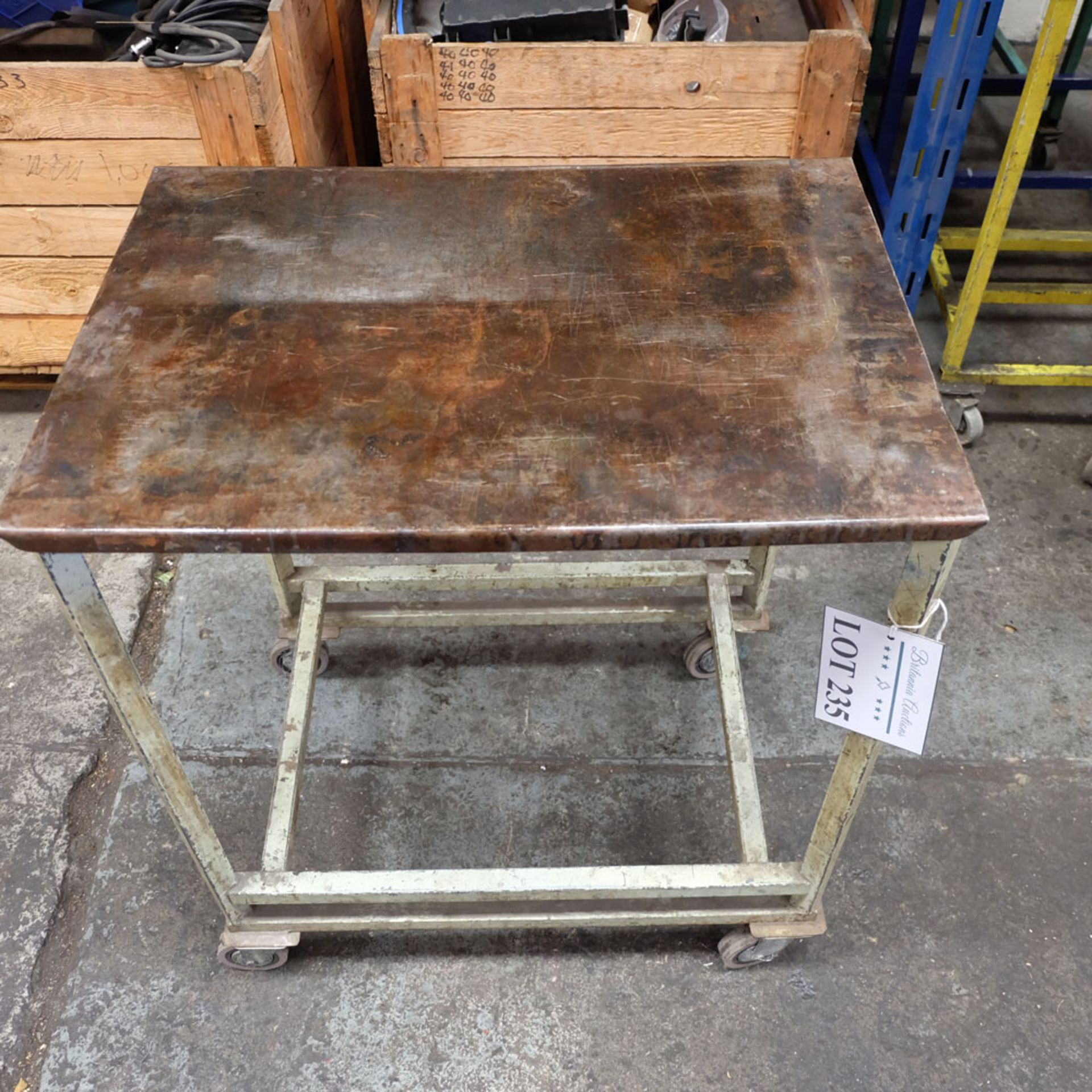 Mobile Steel Table on Castors. Approx Working Height 760mm. Approx Surface Size 650mm x 470mm.