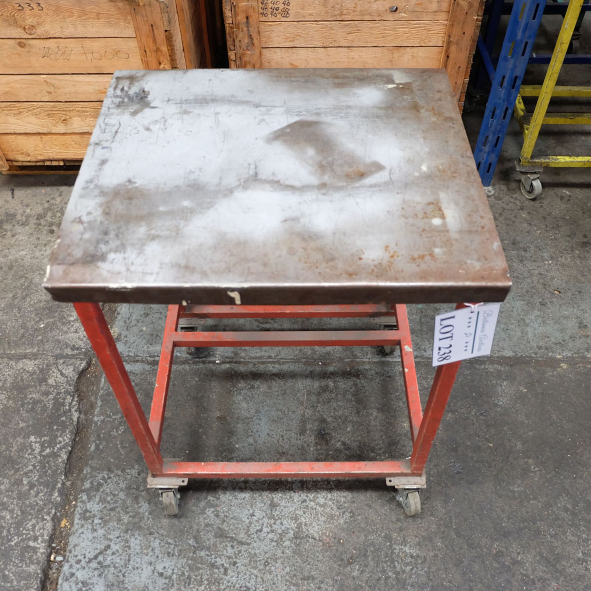 Mobile Steel Table on Castors. Approx Working Height 750mm. Approx Surface Size 580mm x 510mm.