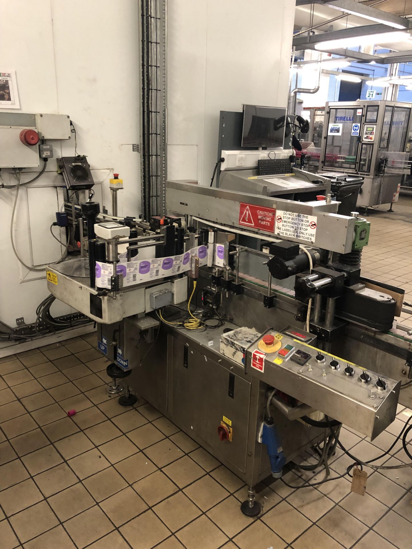 Premier 400 single sided wrap labeler with top hol
