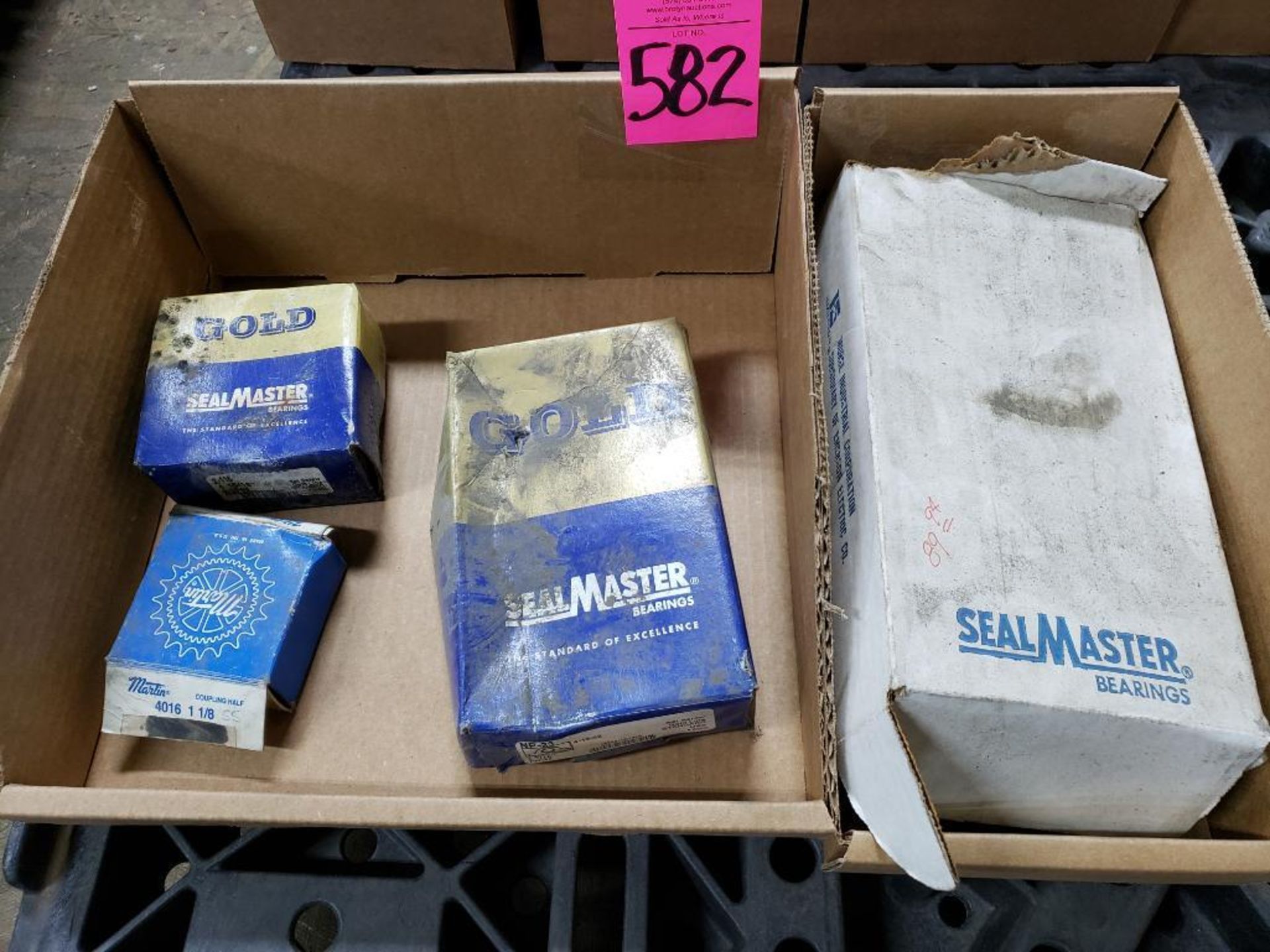 Qty 4 - Sealmaster bearings and martin sprocket. New in box.