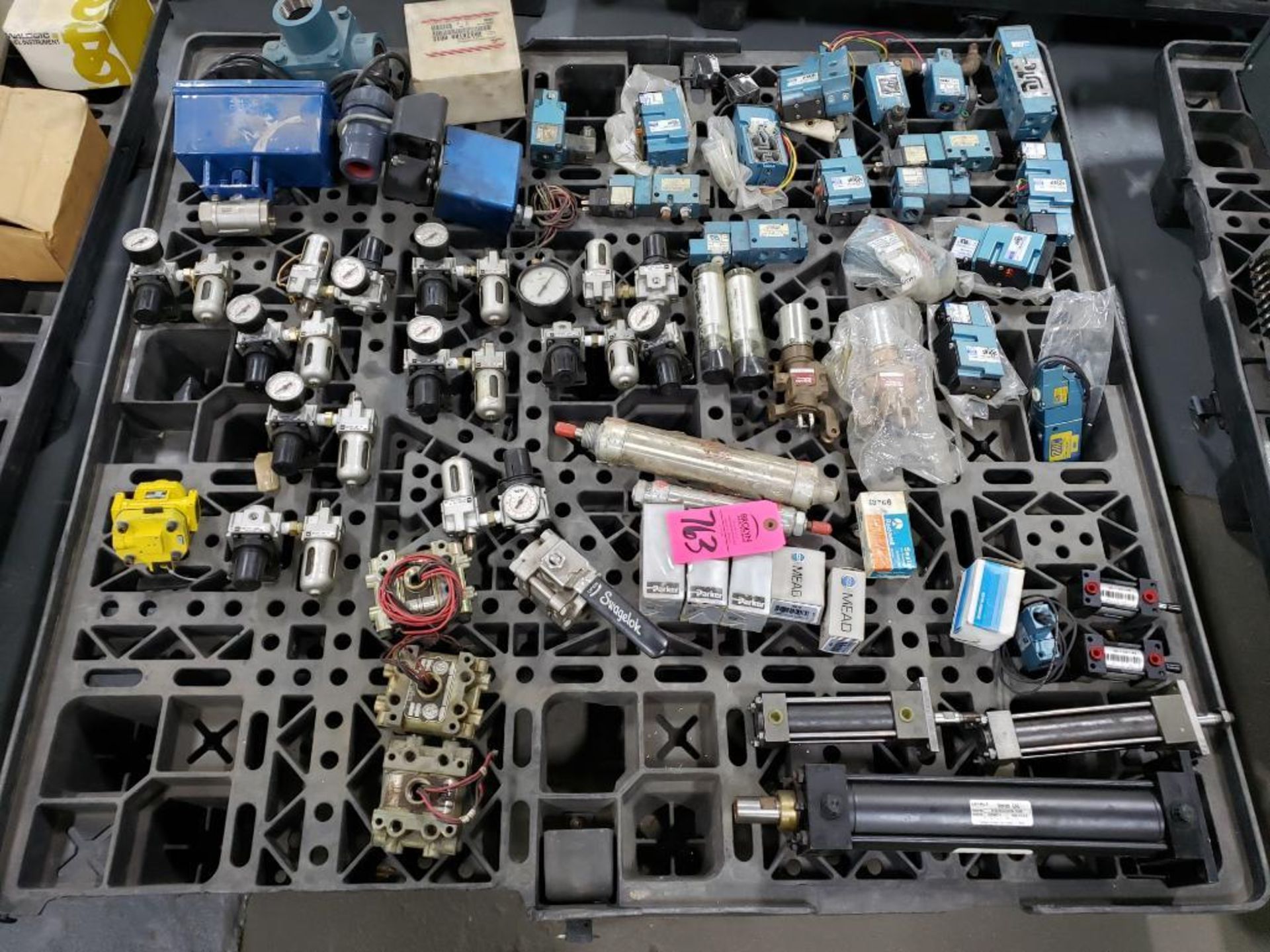 Pallet of assorted repair parts.