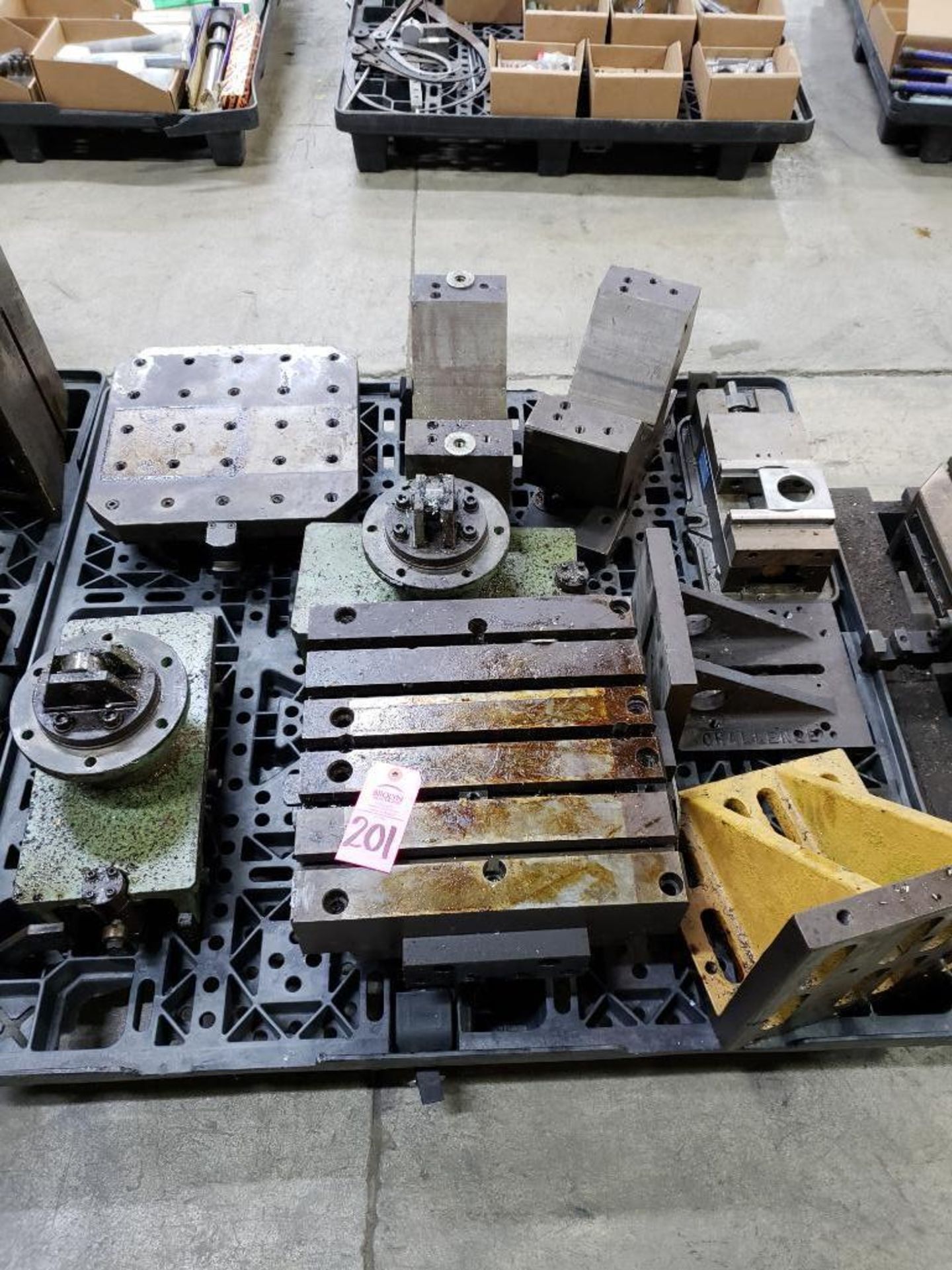 Pallet of assorted machine tooling and set up fixtures.