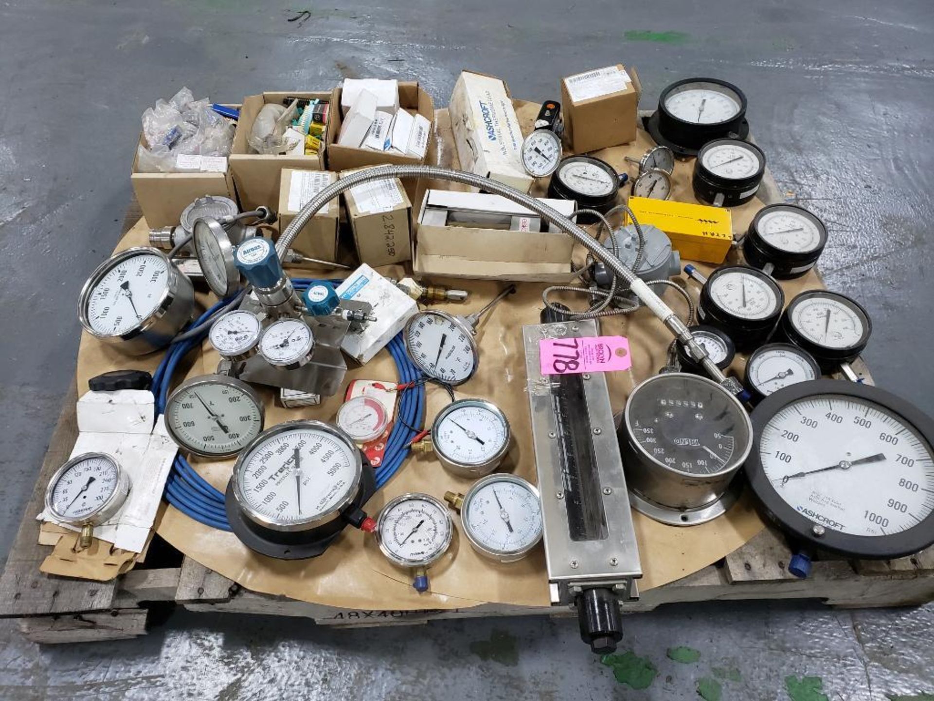 Pallet of assorted parts and equipment.