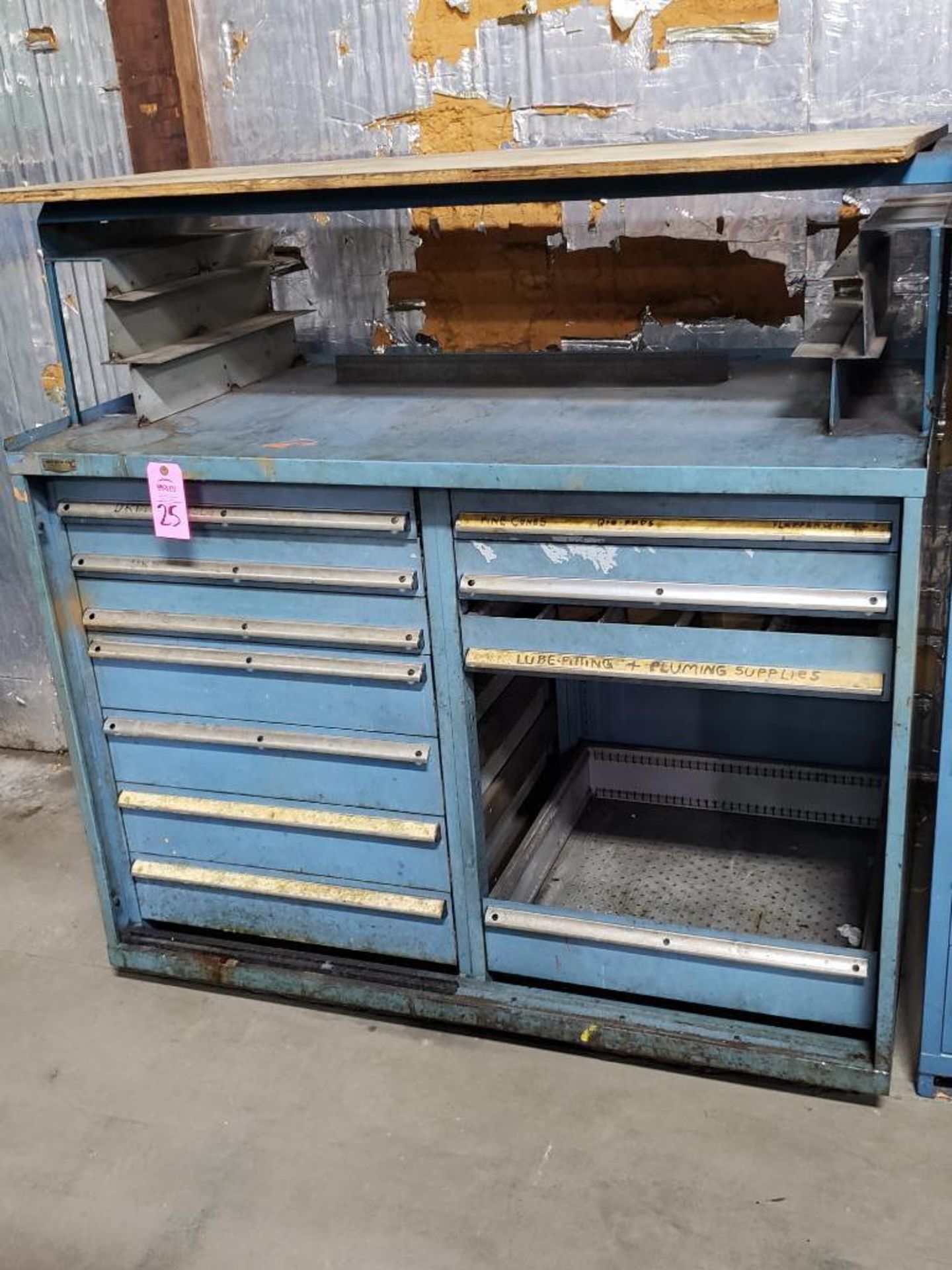 11 drawer Stanley Vidmar tool cabinet work bench. Overall dimensions 57.5Tx56.5Wx31D.