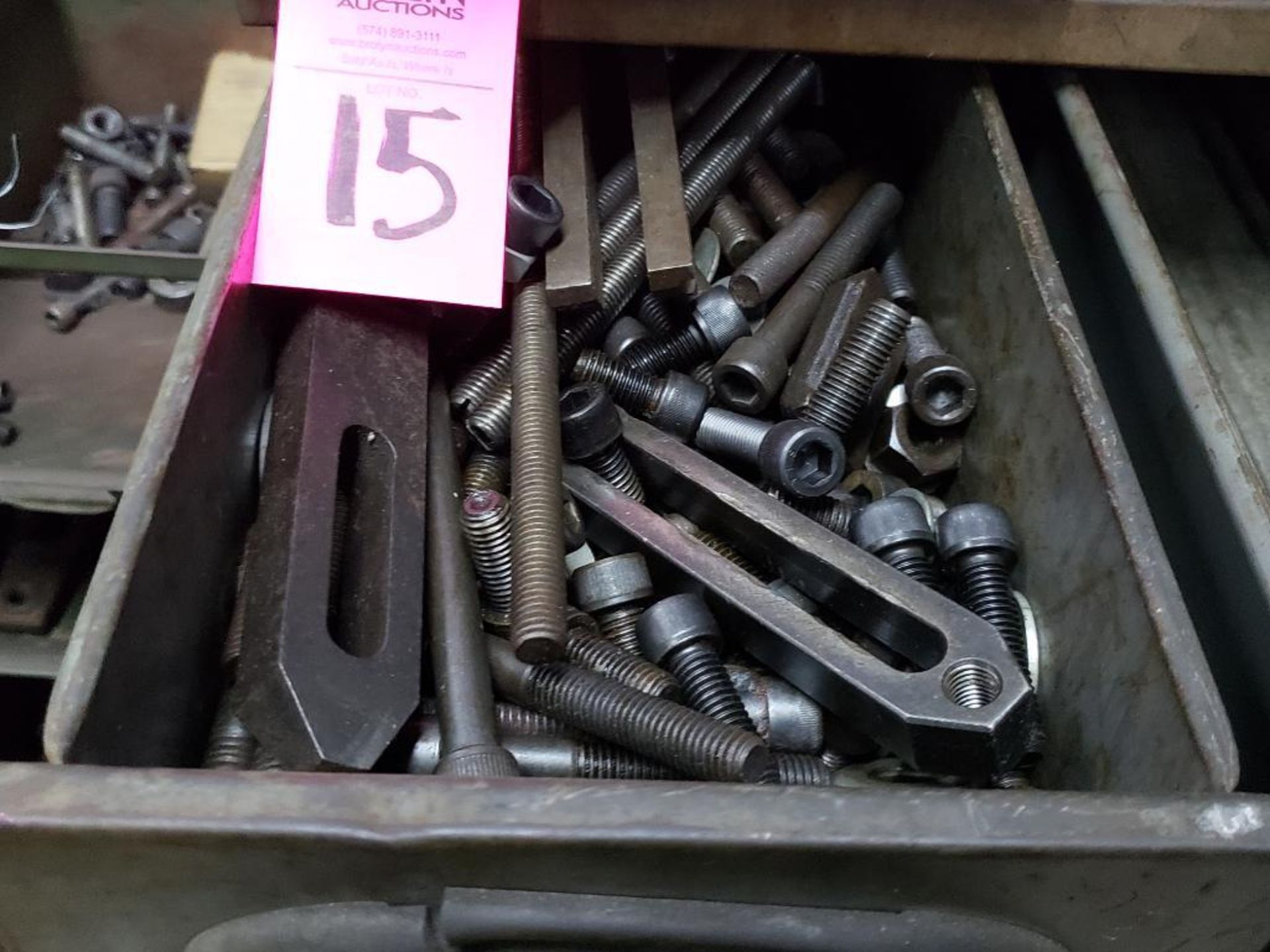 Storage bins and drawers with large quantity of press hold down hardware. - Image 8 of 11