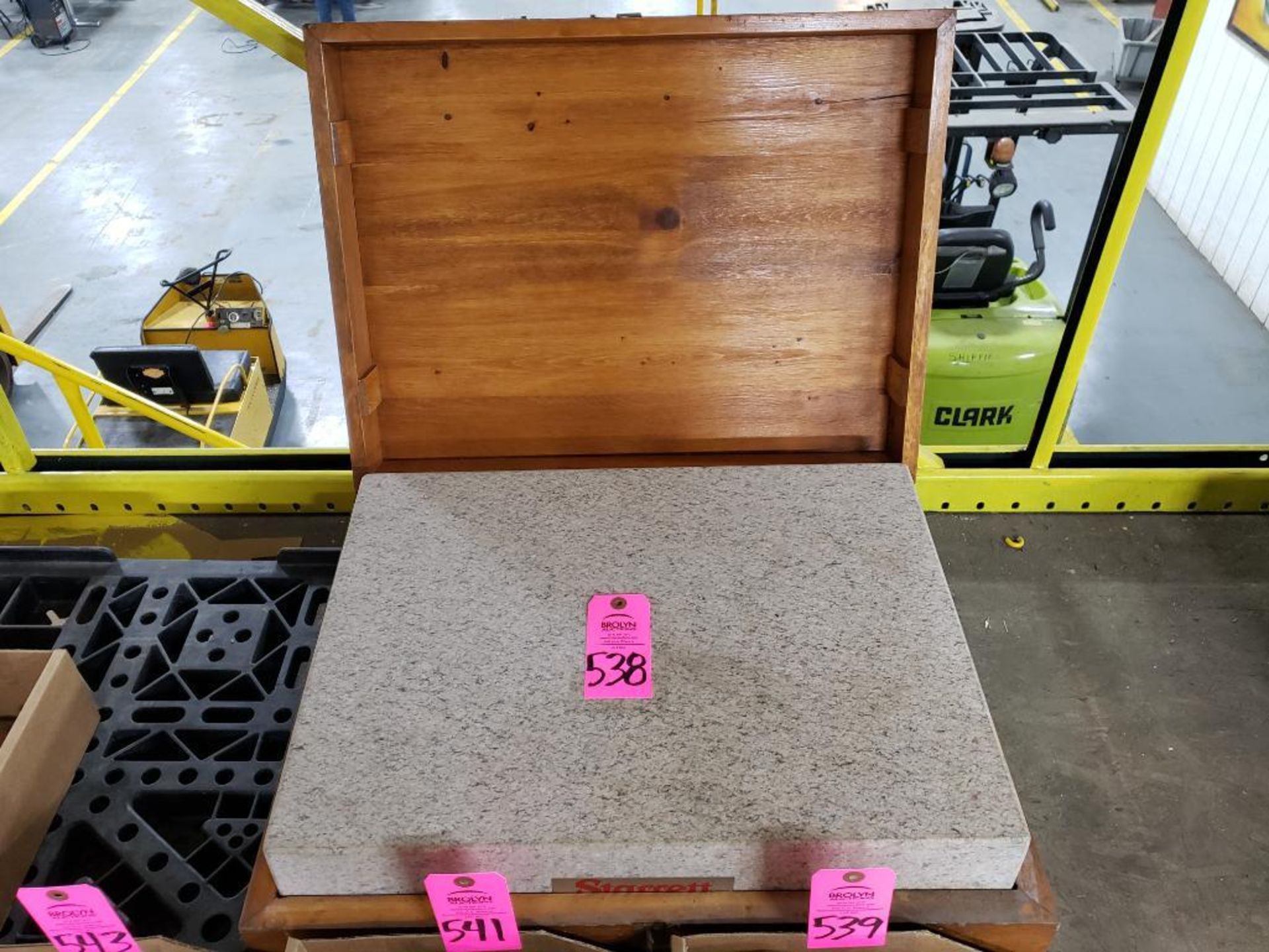 Starrett granite surface plate with wood case.