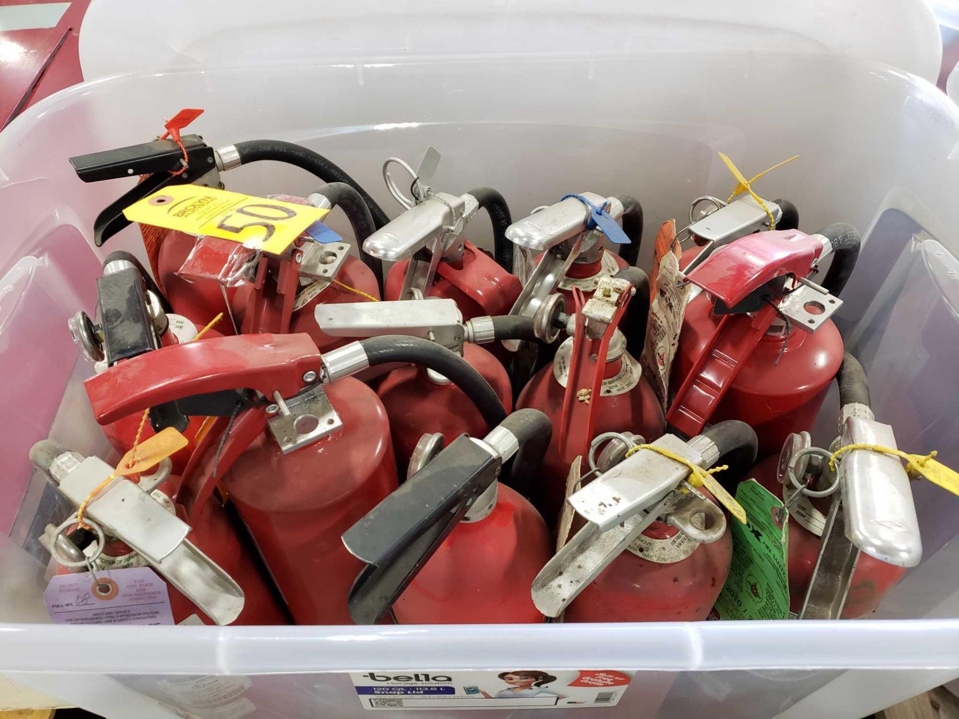 Qty 14 - Fire extinguishers.