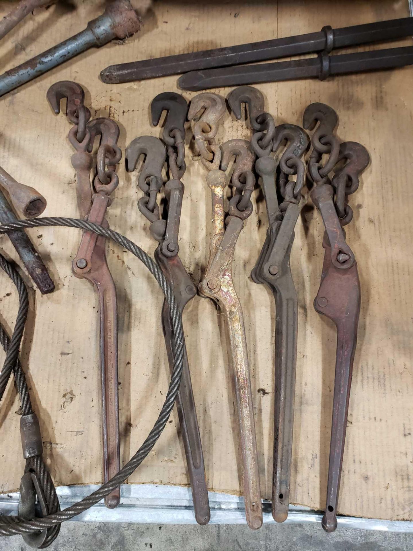 Assorted chain binders, 4 way lug wrenches, and chisels. - Image 2 of 5