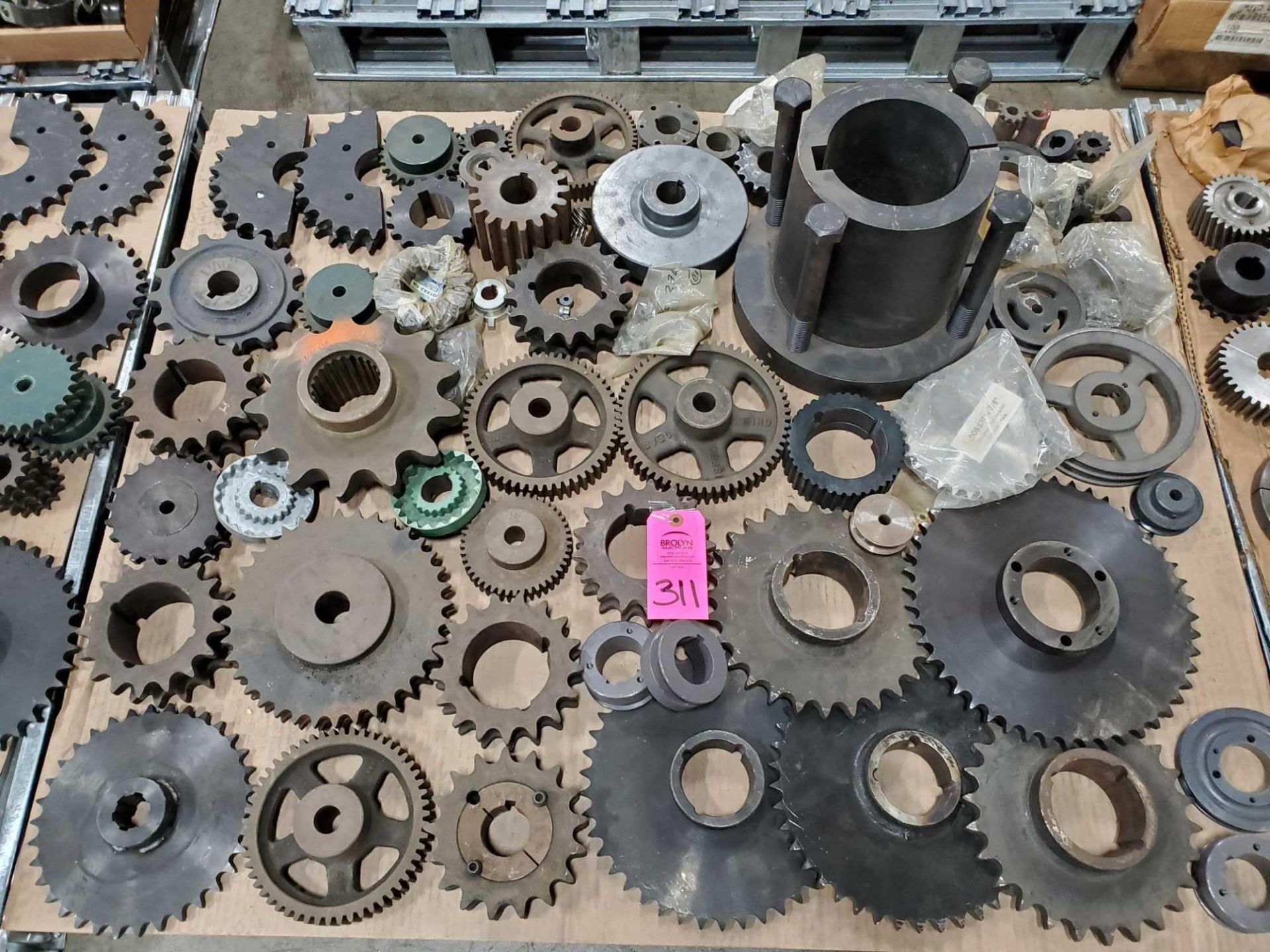 Pallet of assorted pulleys, sheaves, bushings etc. Most new as pictured.