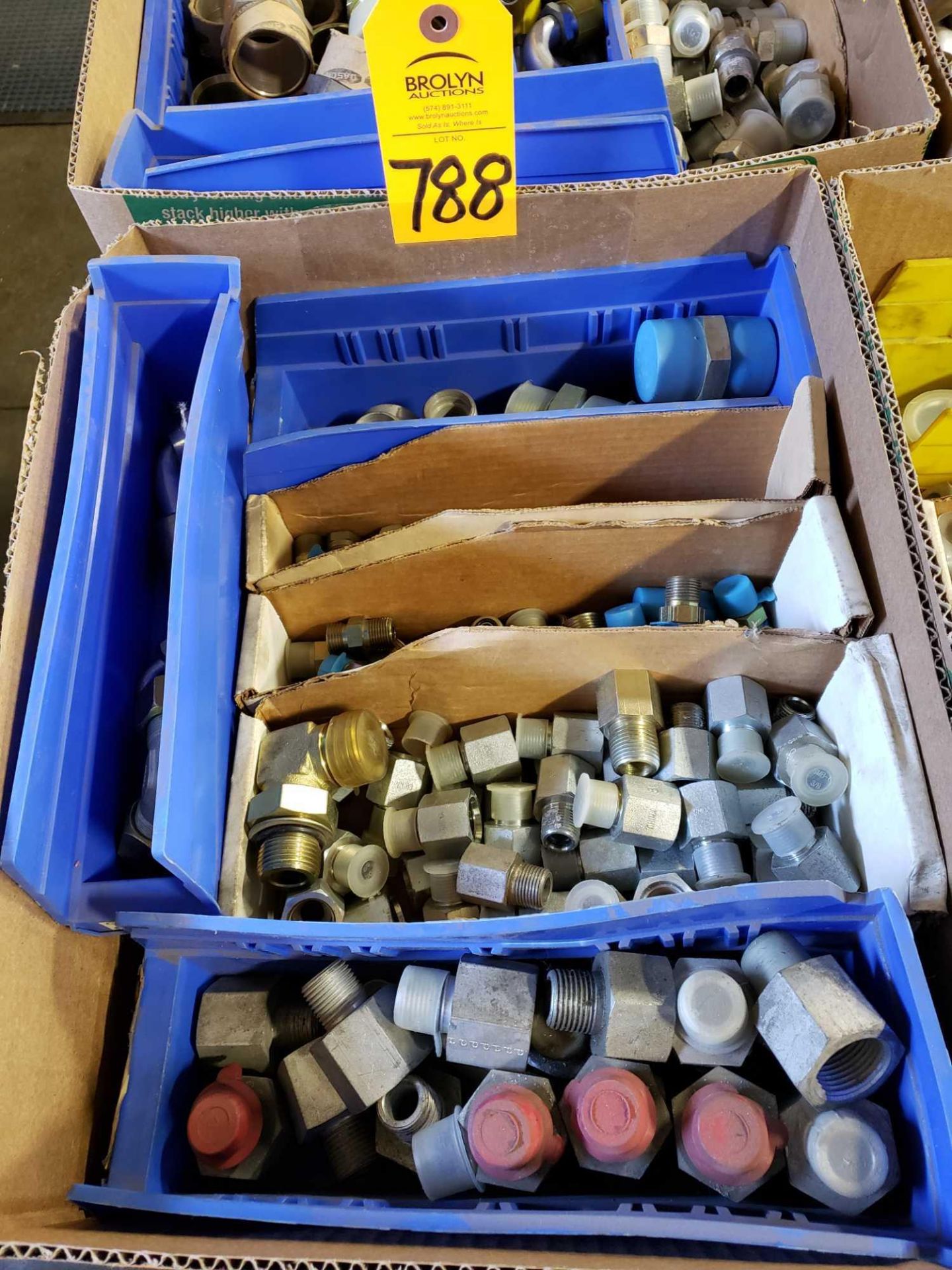 Assorted hydraulic fittings as pictured. New.