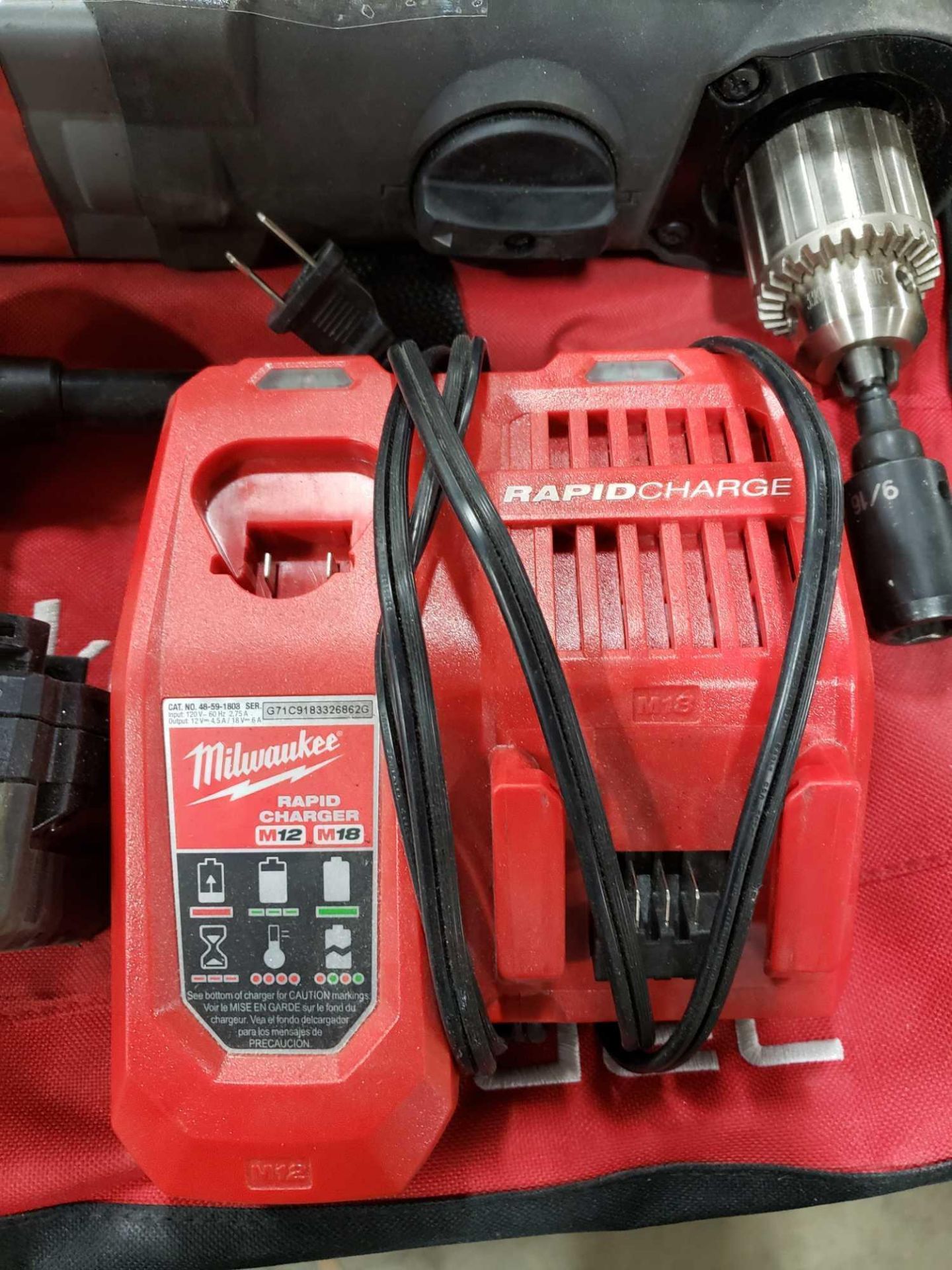 18v Milwaukee 1/2" super hawg right angle cordless drill with 2 batteries, charger, and storage bag. - Image 4 of 4